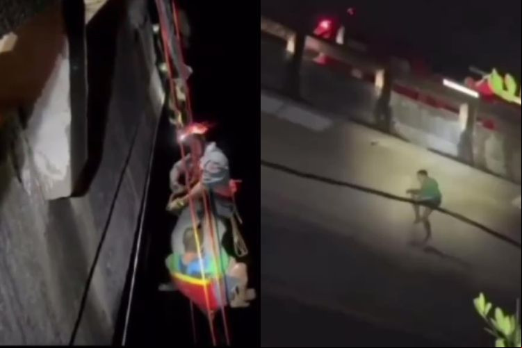 Homem teve que se segurar em cabos de aços após ser jogado de ponte.