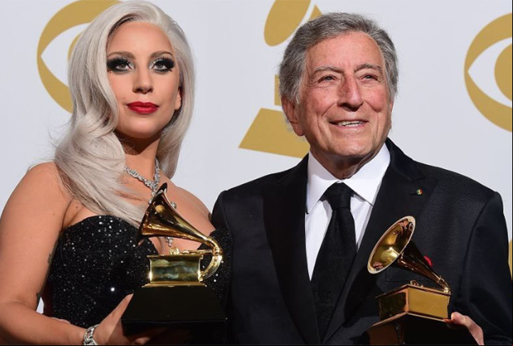 O Guinness Book a registrou como a primeira cantora da história a vender 10 milhões de cópias globais com quatro canções diferentes em um ano. Gaga foi a primeira artista musical a levar cinco premiações na mesma temporada: Oscar, Grammy, Globo de Ouro, Bafta e Critics' Choice.