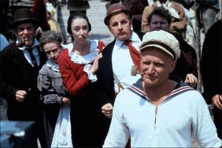 Nesse último longa, Robin Williams (“Gênio Indomável”) interpretou Popeye e Shelley Duvall (“O Iluminado”) fez Olivia Palito.