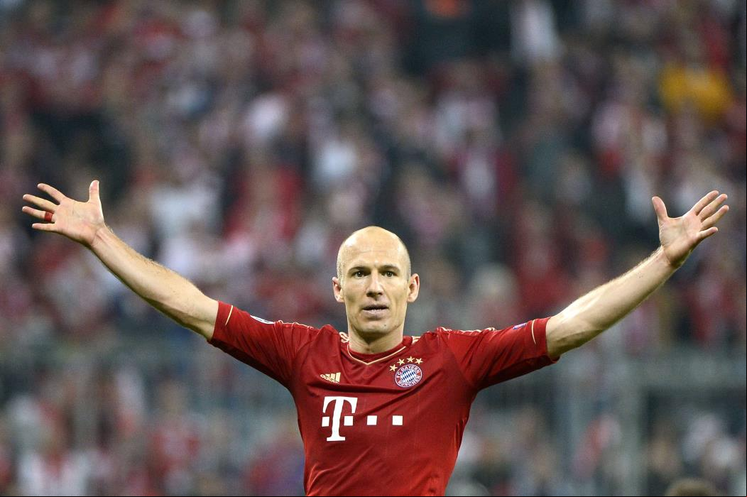 TOPSHOTS
Bayern Munich's Dutch midfielder Arjen Robben celebrates scoring the third goal for his team during the UEFA champions league semi final first leg football match FC Bayern Muenchen vs FC Barcelona on April 23, 2013 in Munich, southern .   AFP PHOTO / PIERRE-PHILIPPE MARCOU
